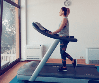 woman walking on a flat treadmill