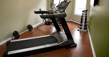 apartment treadmill and dumbbells